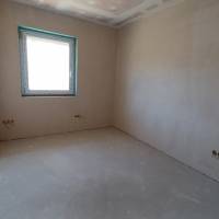Eladó egy kiváló elhelyezkedésű, 88,75 m² hasznos alapterületű ikerházfél Bugyi központjához közel!