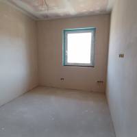 Eladó egy kiváló elhelyezkedésű, 88,75 m² hasznos alapterületű ikerházfél Bugyi központjához közel!